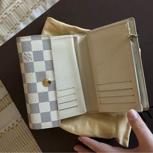 Louis Vuitton women’s wallet.